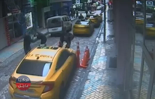 شاهد بالفيديو رجل في إلازِغ يسقط من الطابق الثاني على سيارة أجرة