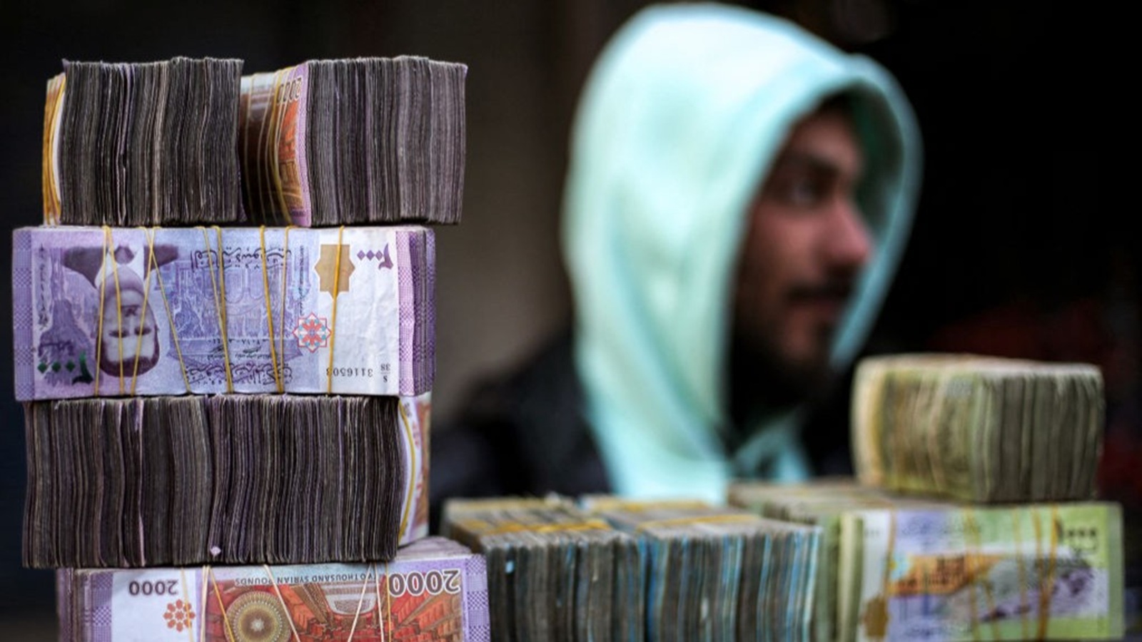 100 دولار كم ليرة سورية؟